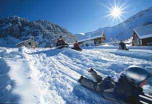 Kids sledging in Malbun